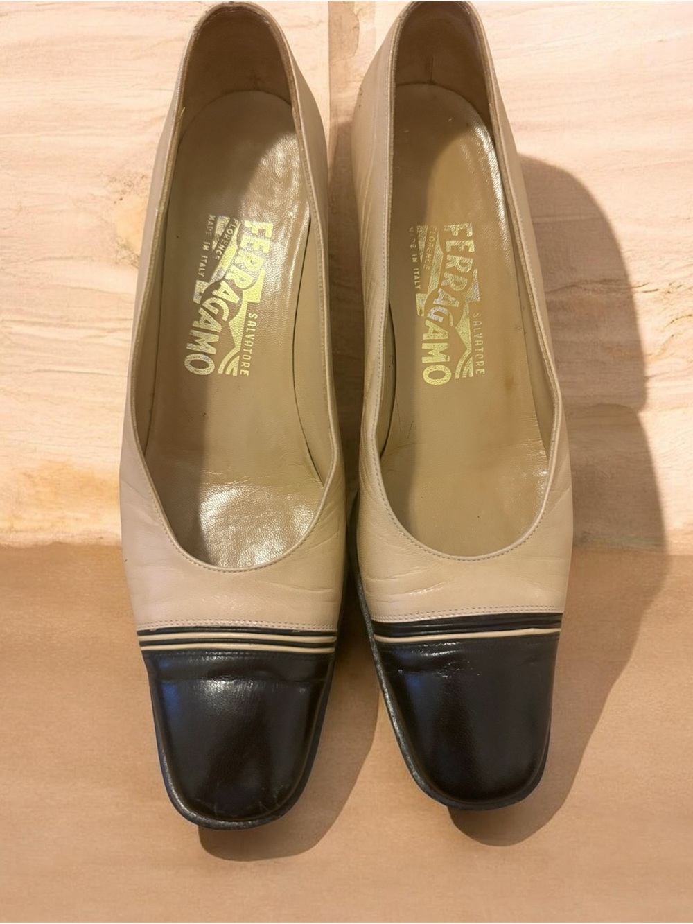 Salvatore Ferragamo Beige and Black Two-Tone Leather Pumps